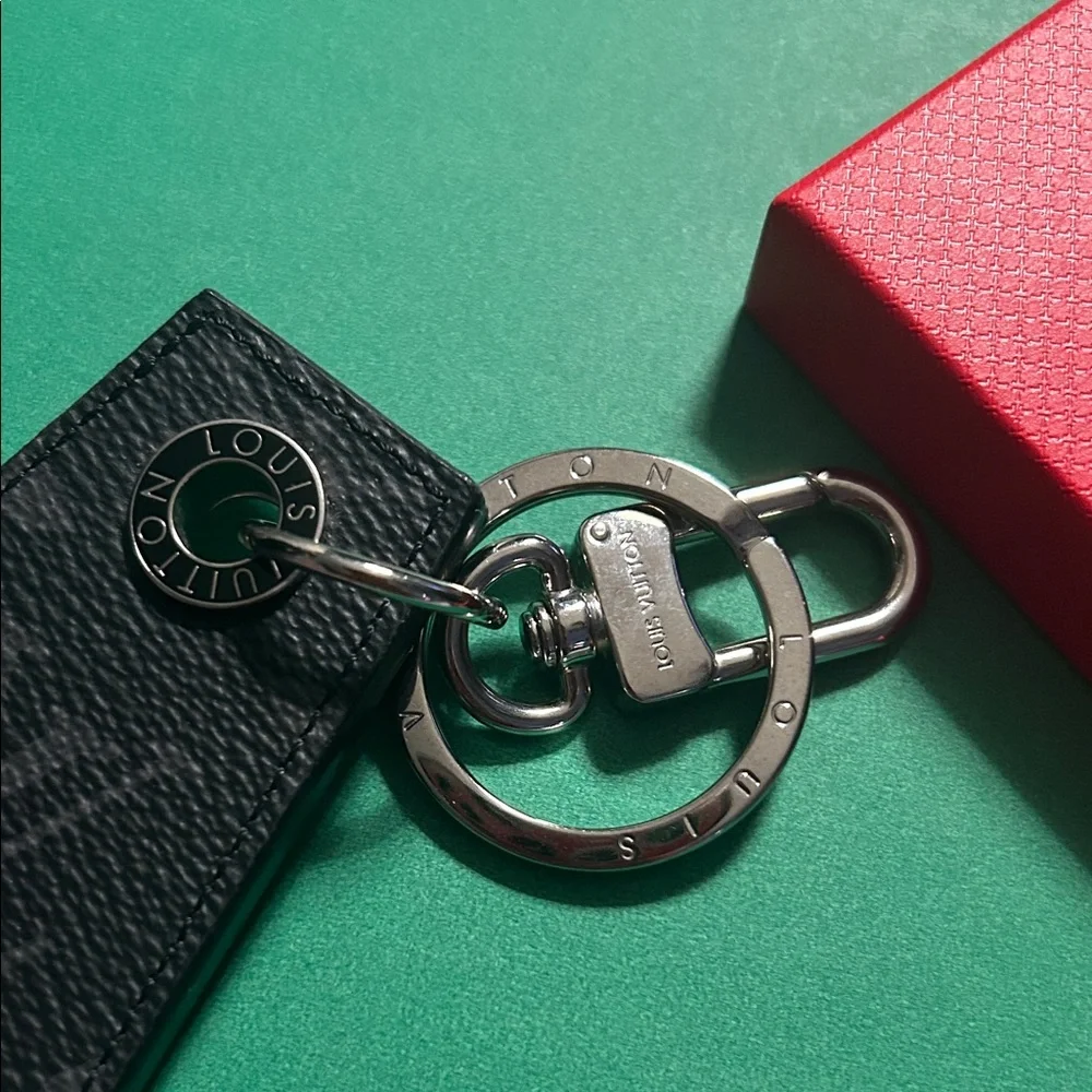 79. Louis Vuitton Monogram Eclipse Key Holder/Charm with COA